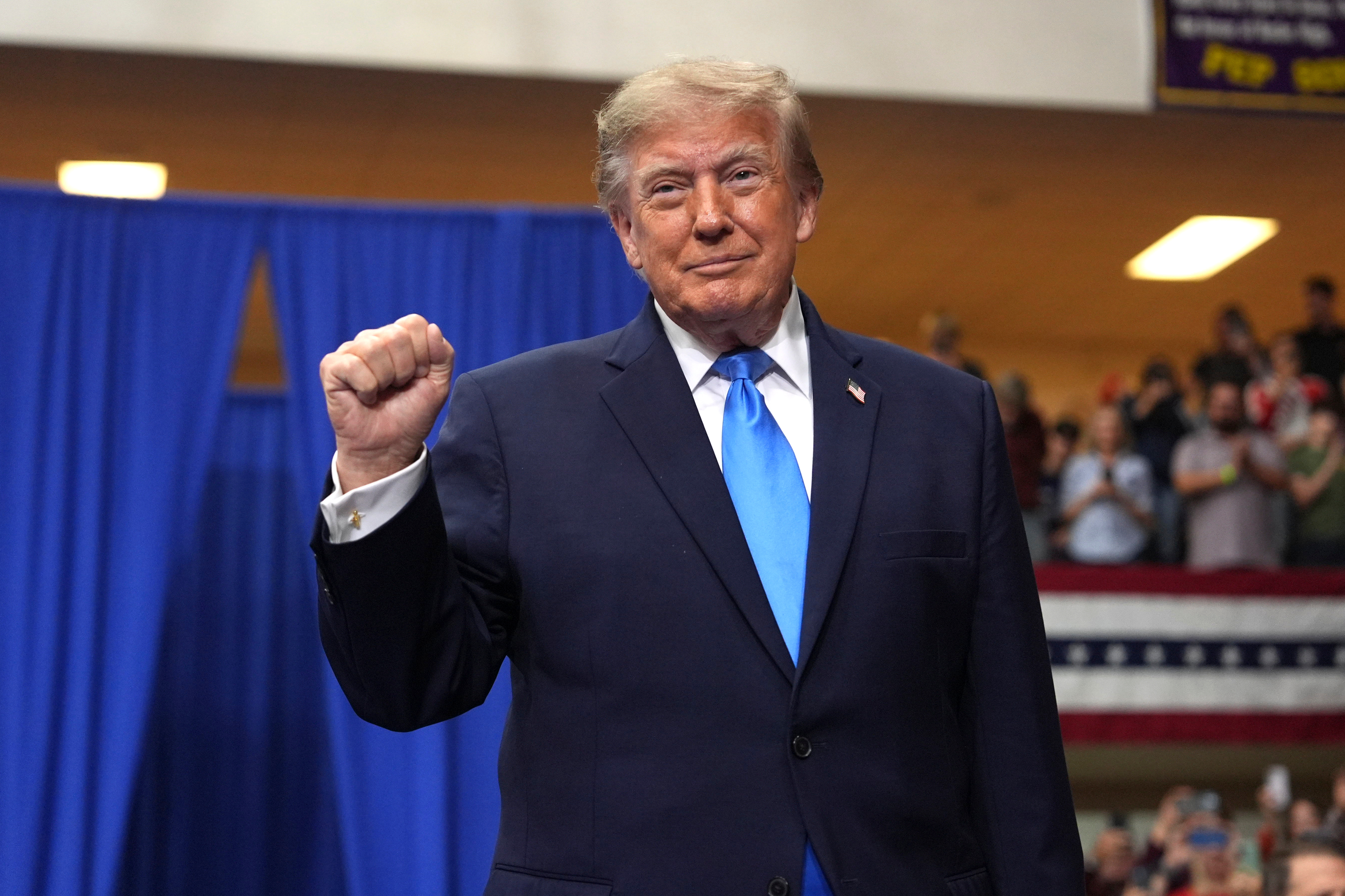 President Donald Trump arrives to speak during an event at Butler High School in Vandalia, Ohio, Saturday, Oct. 3, 2026. (AP Photo/Mark Schiefelbein)