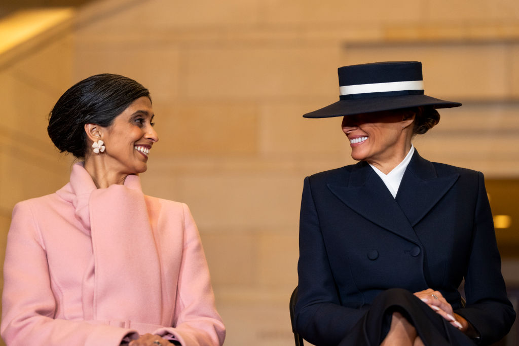 WASHINGTON, DC - JANUARY 20: Second lady Usha Chilukuri Vance and first lady Melania Trump as U.S. President Donald Trump (not pictured) addresses guests and supporters in an overflow room in Emancipation Hall after his inauguration at the U.S Capitol on January 20, 2025 in Washington, DC. Donald Trump takes office for his second term as the 47th President of the United States. (Photo by Greg Nash-Pool/Getty Images)