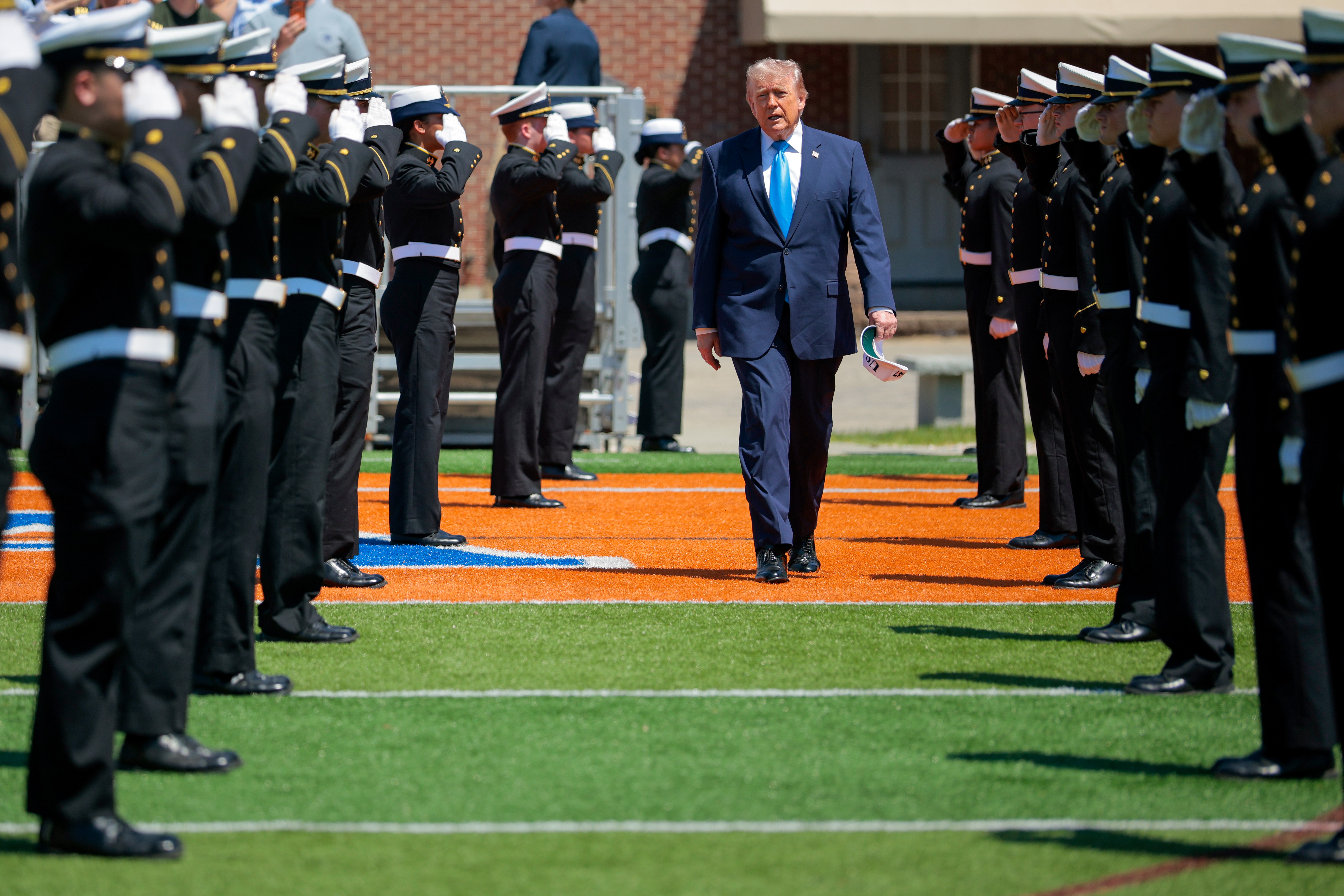 NEW LONDON, CONNECTICUT - MAY 20: U.S. President Donald Trump arrives to the commencement ceremony on Cadet Memorial Field at the United States Coast Guard Academy on May 20, 2026 in New London, Connecticut. This is the 145th U.S. Coast Guard commencement. (Photo by Chip Somodevilla/Getty Images)