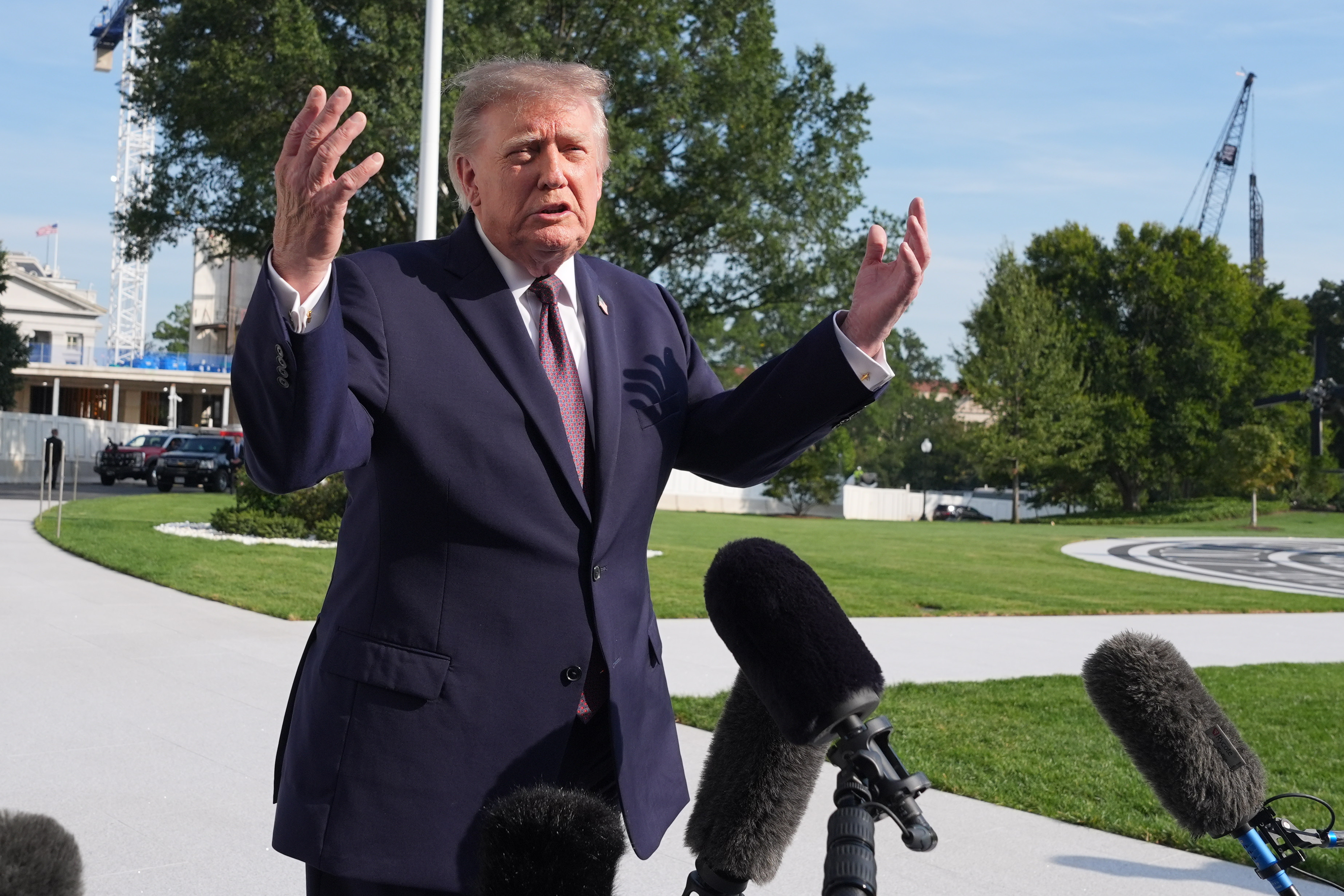 President Donald Trump speaks with reporters before departing on Marine One from the South Lawn of the White House, Friday, Oct. 2, 2026, in Washington. (AP Photo/Alex Brandon)