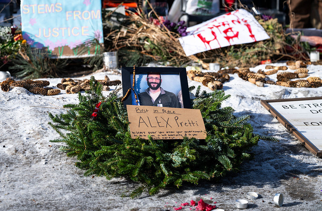 MINNEAPOLIS, MINNESOTA - JANUARY 25: A portrait stands at a memorial for Alex Pretti on January 25, 2026 in Minneapolis, Minnesota. Pretti, an ICU nurse at a VA medical center, died on January 24 after being shot multiple times during an altercation with U.S. Border Patrol agents in the Eat Street district of Minneapolis. (Photo by Stephen Maturen/Getty Images)