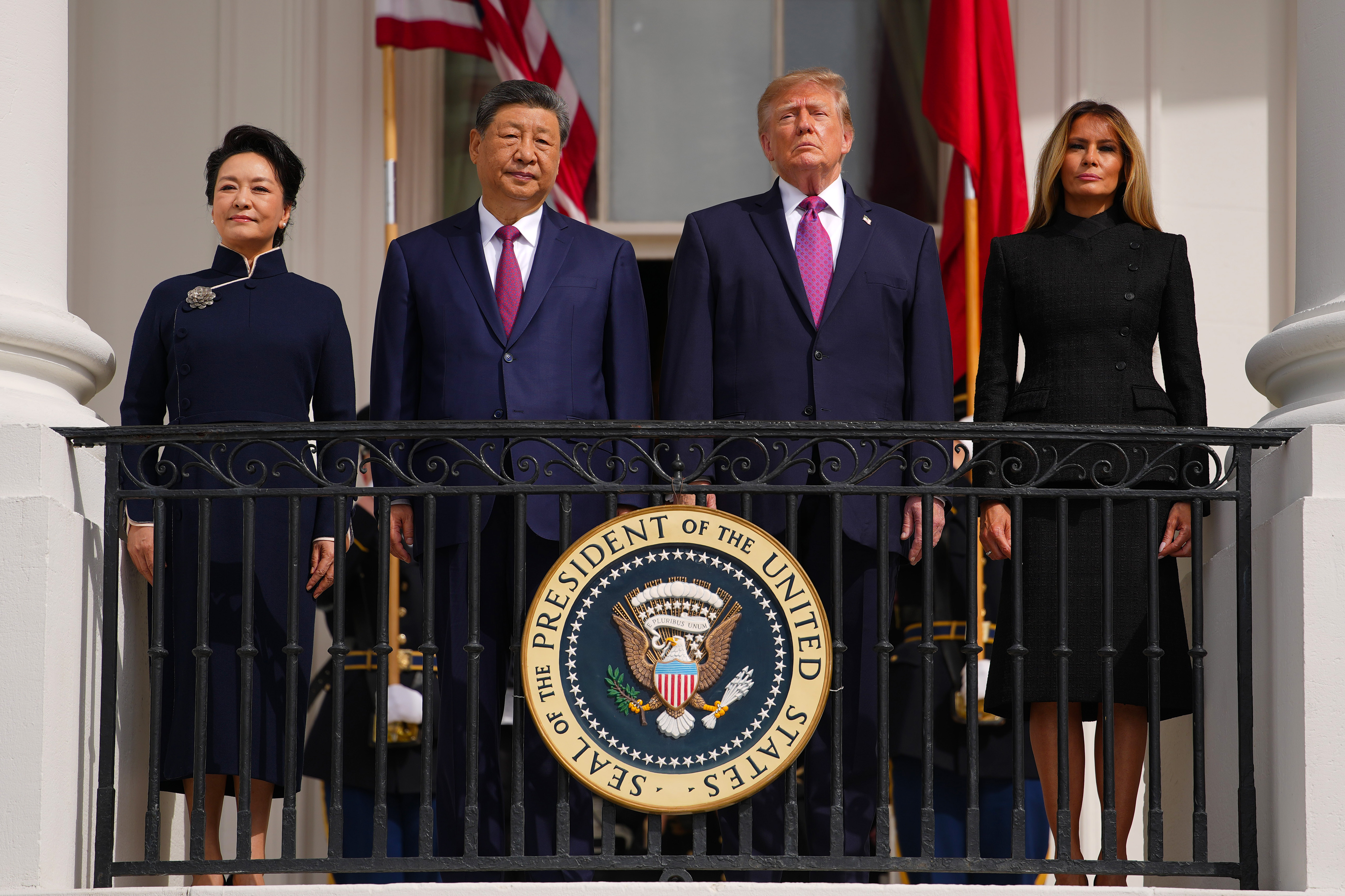WASHINGTON, DC - SEPTEMBER 24: (L-R) First lady of China Peng Liyuan, President&nbsp;of&nbsp;China Xi Jinping, U.S. President Donald Trump and first lady Melania Trump look on from the South Portico  of the White House during a Silent Drill Platoon Review on September 24, 2026 in Washington, DC. President Trump is hosting President Xi for a three-day state visit to Washington, DC where the leaders are expected to discuss trade practices, artificial intelligence and furthering