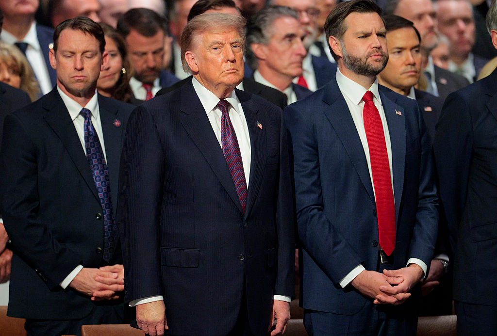 WASHINGTON, DC - JULY 28: U.S. President Donald Trump (C) and U.S. Vice President JD Vance attend the funeral service for the late U.S. Sen. Lindsey Graham (R-SC) at the Washington National Cathedral on July 28, 2026 in Washington, DC. Graham,&nbsp;who was elected to the Senate in 2002, died suddenly on July 11th from an aortic dissection. He was 71 years old. (Photo by Chip Somodevilla/Getty Images)