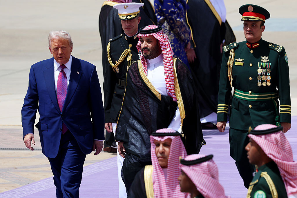 RIYADH, SAUDI ARABIA - MAY 13: U.S. President Donald Trump is greeted by Saudi Crown Prince Mohammed bin Salman as he arrives at King Khalid International Airport on May 13, 2025, in Riyadh, Saudi Arabia. Trump begins a multi-nation tour of the Gulf region focused on expanding economic ties and reinforcing security cooperation with key U.S. allies.  (Photo by Win McNamee/Getty Images)