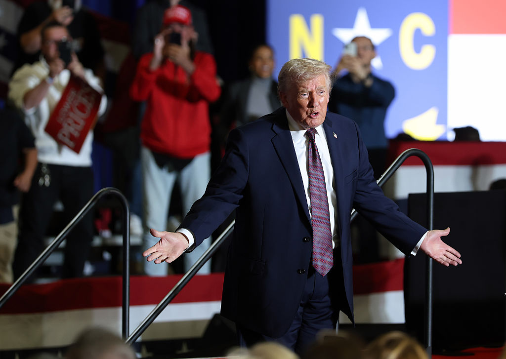 ROCKY MOUNT, NORTH CAROLINA - DECEMBER 19: U.S. President Donald Trump delivers remarks during a rally at the Rocky Mount Event Center on December 19, 2025 in Rocky Mount, North Carolina. Trump spoke on his plans to lower the cost of staples, including gas and health care, while blaming the Biden administration for the economic challenges inherited by his administration. (Photo by Tasos Katopodis/Getty Images)