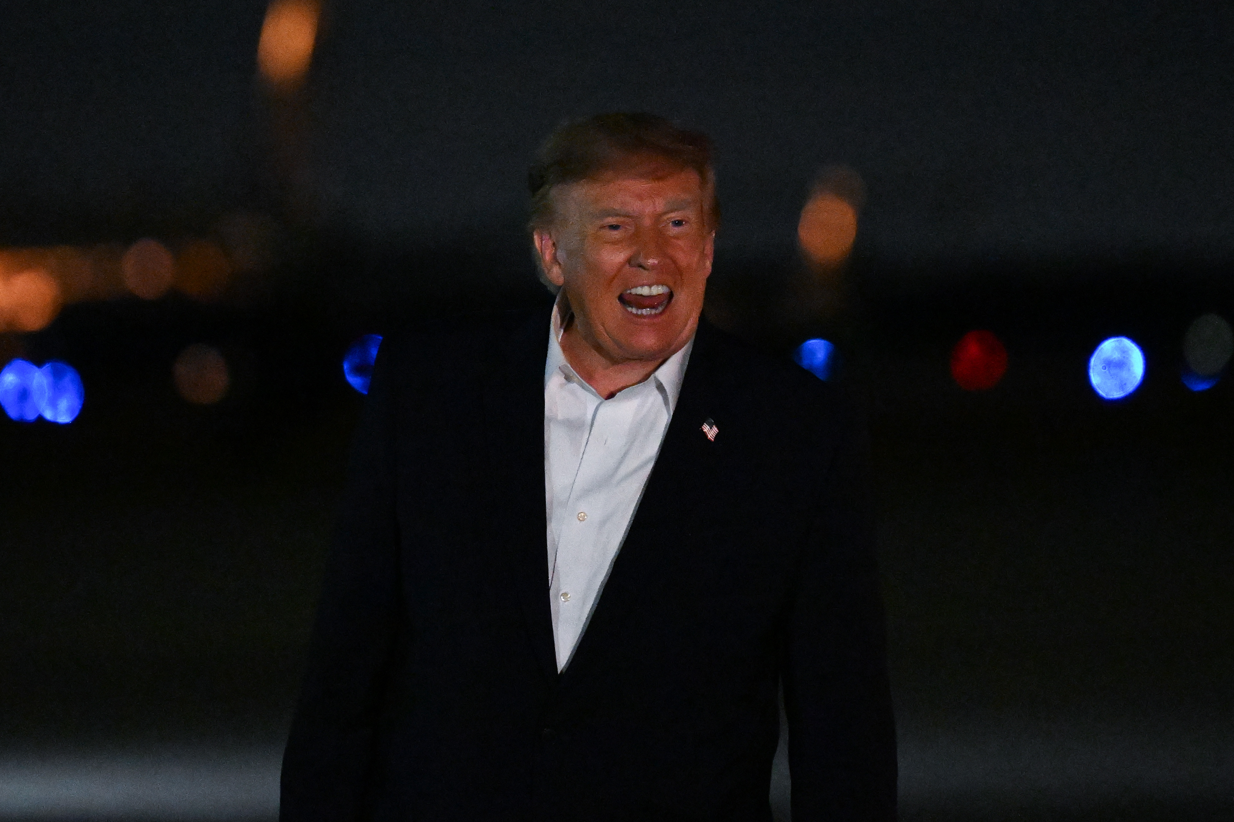 JOINT BASE ANDREWS, MARYLAND - OCTOBER 03: U.S. President Donald Trump speaks to reporters after stepping off Air Force One on October 03, 2026 in Joint Base Andrews, Maryland. Trump is returning to Washington after attending a rally at Vandalia, Ohio in the final weeks before the midterm elections to campaign for Republican candidates. (Photo by Roberto Schmidt/Getty Images)