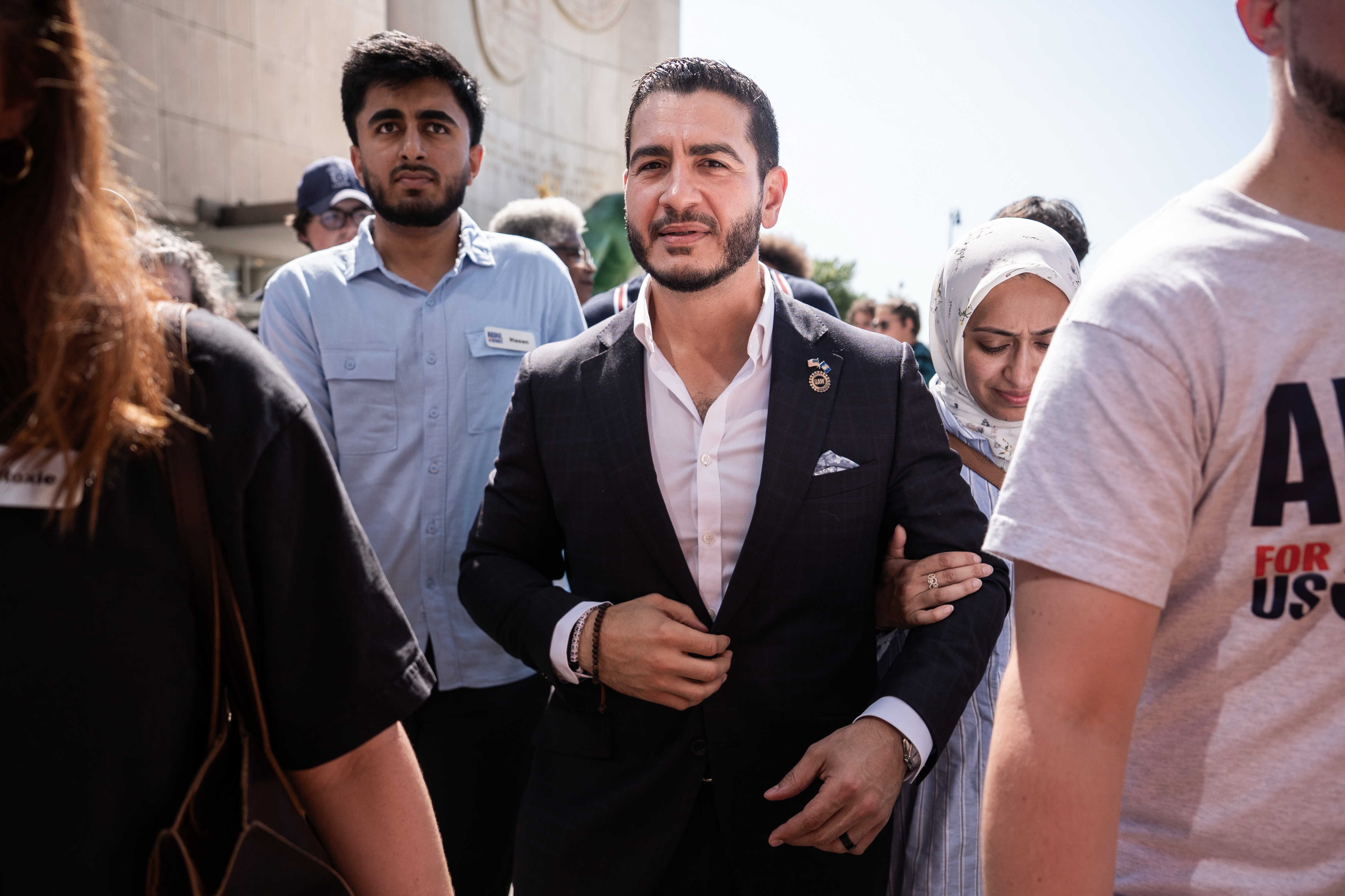 Abdul El-Sayed departs following a news conference at the Spirit of Detroit shortly after winning the Democratic nomination for U.S. Senate in Michigan, Wednesday, Aug. 5, 2026, in Detroit. (AP Photo/Julia Demaree Nikhinson)