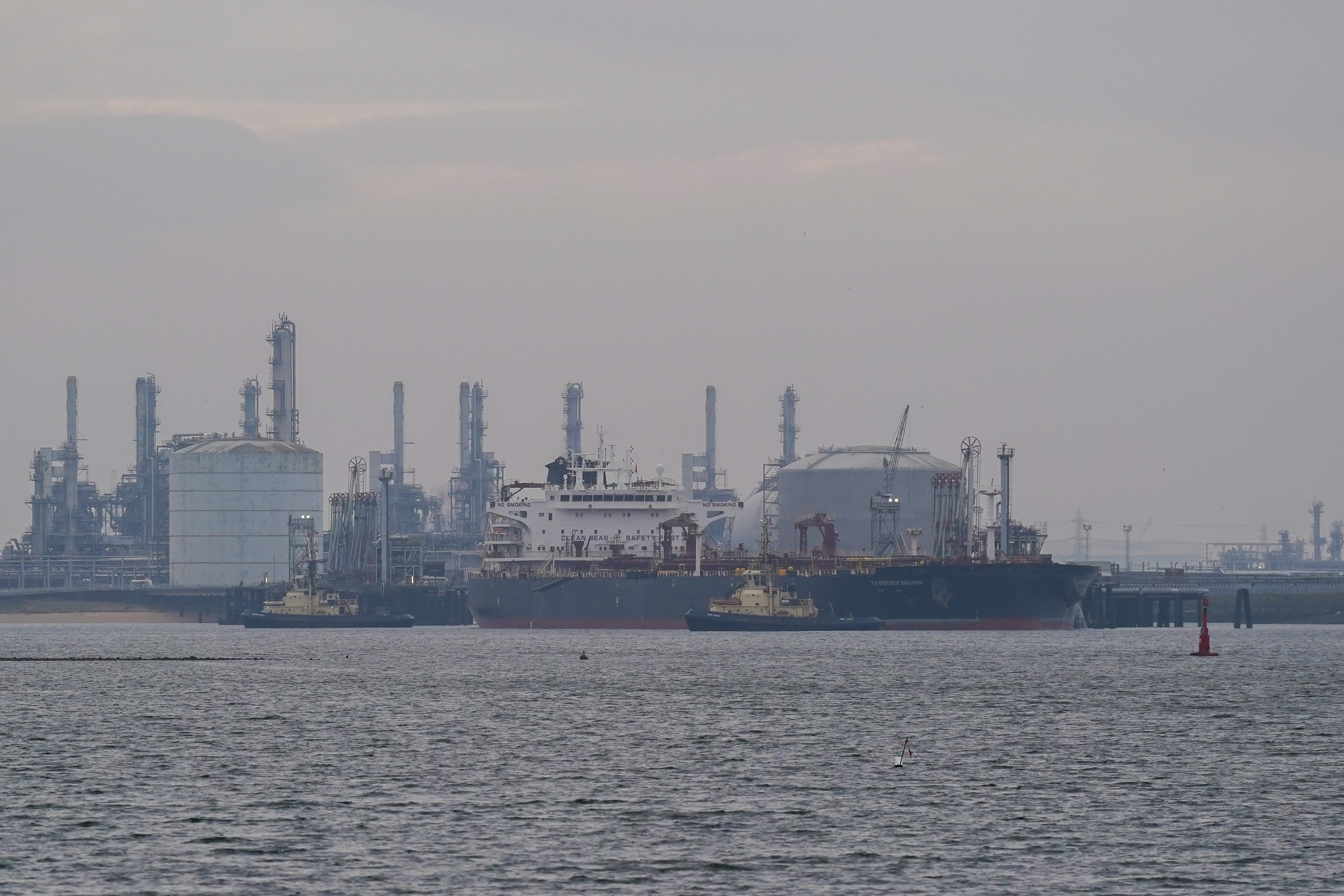 TEESSIDE, ENGLAND - MARCH 09: The ‘Tavistock Square’ crude oil tanker, assisted by tugs, prepares to leave the ConocoPhillips oil terminal after loading on March 09, 2026 in Teesside, England. Global oil prices have risen to their highest levels since 2022 following an escalation of the US-Israel war with Iran. Brent crude, the international benchmark, surged past the $100 psychological threshold. Liquid Natural Gas (LNG) prices have also seen a 50% increase since the US and Israel attacked Iran. The war has  effectively closed the Strait of Hormuz  which sees over a fifth of the global oil and LNG trade pass through narrow gulf. (Photo by Ian Forsyth/Getty Images)