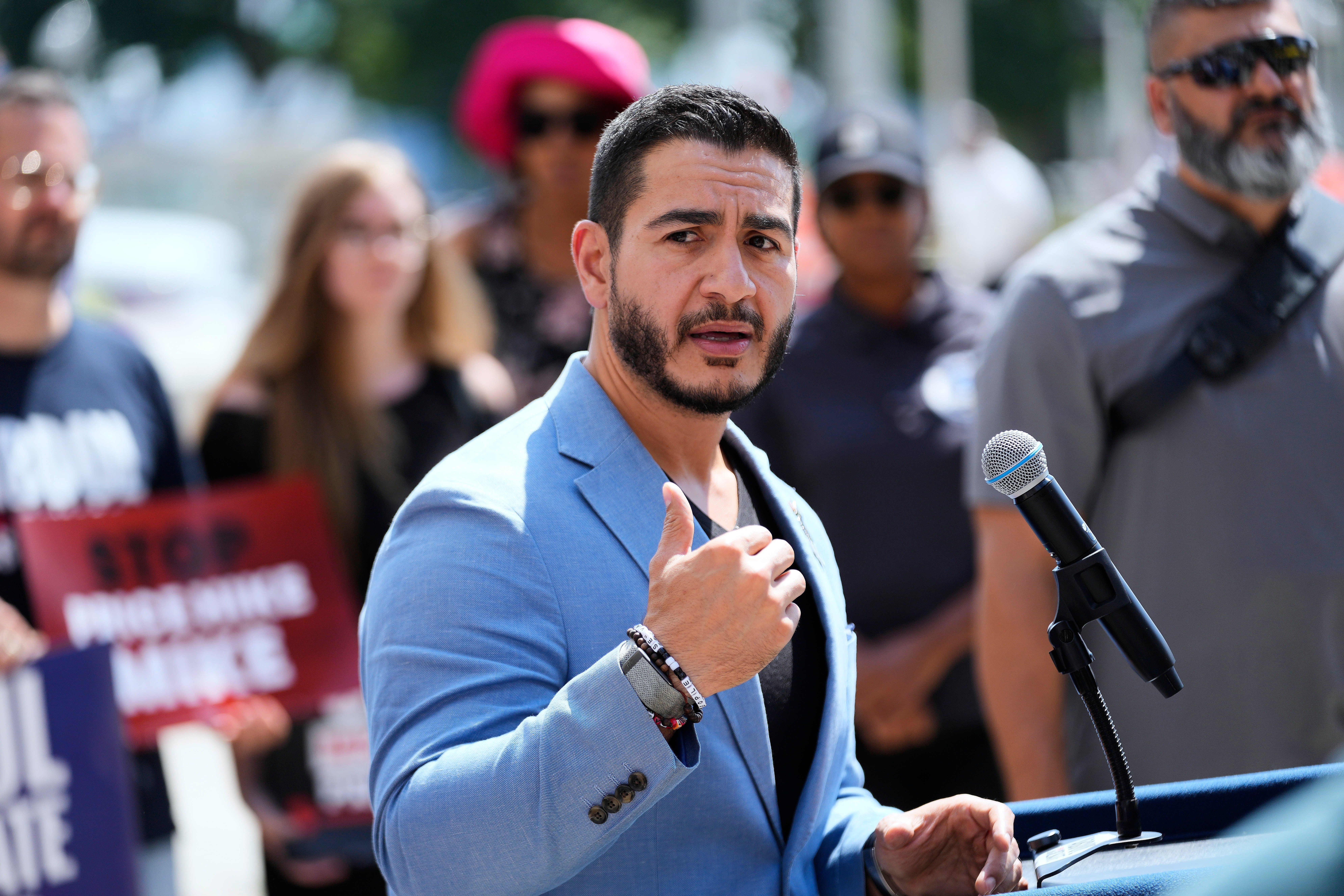 Democratic nominee for U.S. Senate Abdul El-Sayed speaks at a news conference at the base of the Spirit of Detroit monument in Detroit, Wednesday, Aug. 19, 2026. (AP Photo/Paul Sancya)