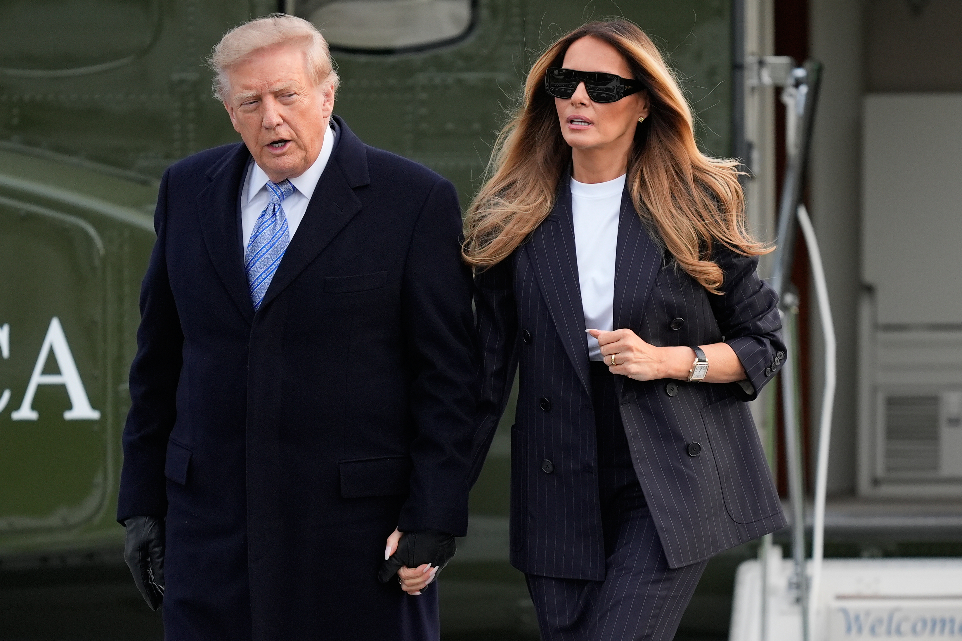 President Donald Trump and first lady Melania Trump arrive at the White House on Marine One, Wednesday, Sept. 23, 2026, in Washington, after greeting China's President Xi Jinping at Joint Base Andrews. (AP Photo/Manuel Balce Ceneta)