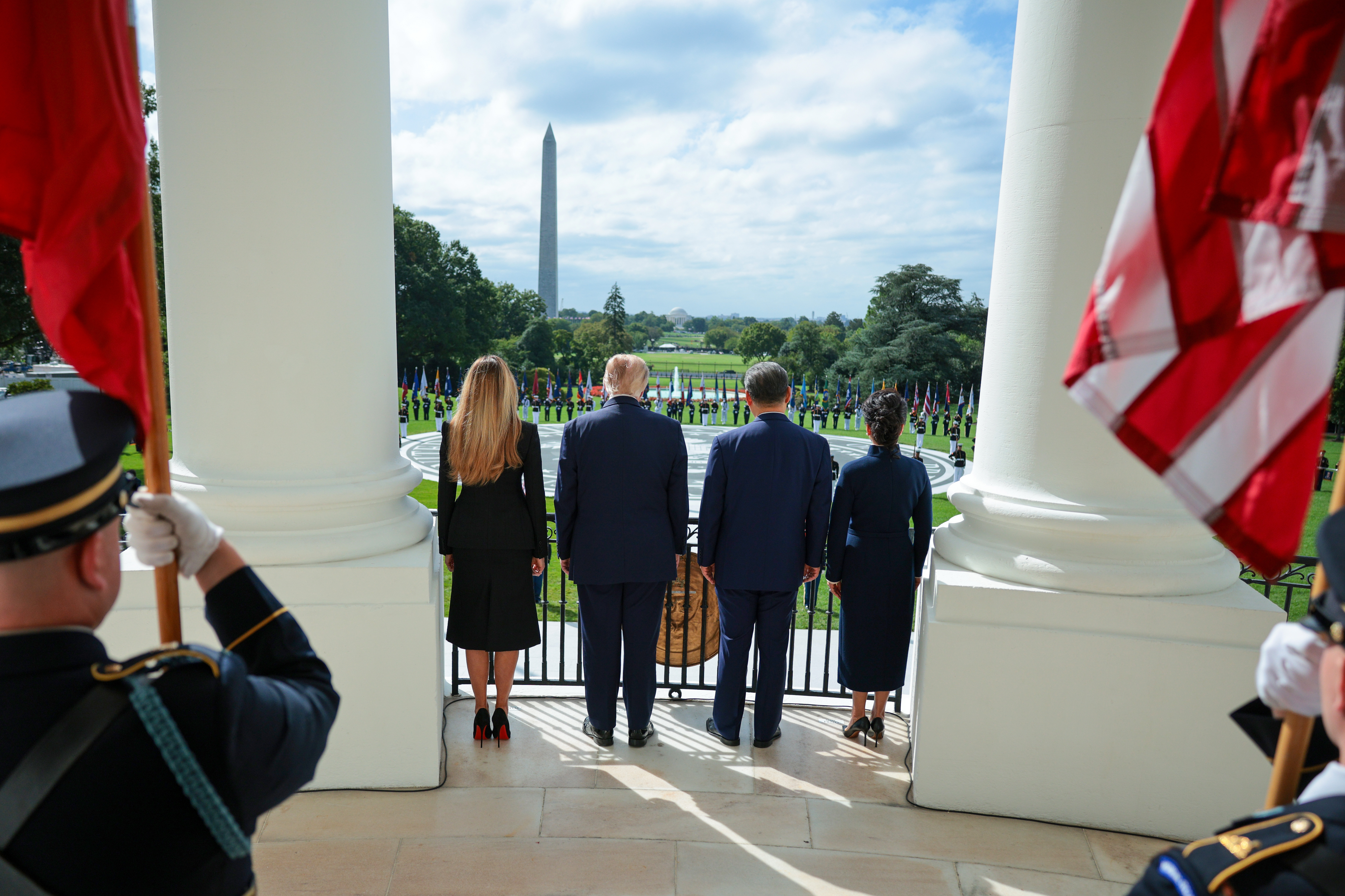 WASHINGTON, DC - SEPTEMBER 24: (L-R) U.S. first lady Melania Trump, U.S. President Donald Trump, President&nbsp;of&nbsp;China Xi Jinping, and first lady of China Peng Liyuan watch a Silent Drill Platoon Review at the White House on September 24, 2026 in Washington, DC. President Trump is hosting President Xi for a three-day state visit to Washington, DC where the leaders are expected to discuss trade practices, artificial intelligence and furthering