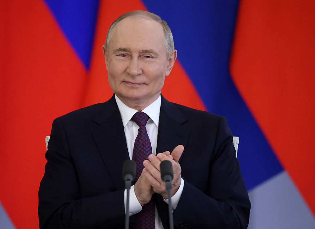 MOSCOW, RUSSIA - JULY 31 (RUSSIA OUT) Russian President Vladimir Putin applauds during Russian-Laotian talks, at the Kremlin on July 31, 2025, in Moscow, Russia. President of Laos Sisoulith is having an official visit to Russia. (Photo by Contributor/Getty Images)