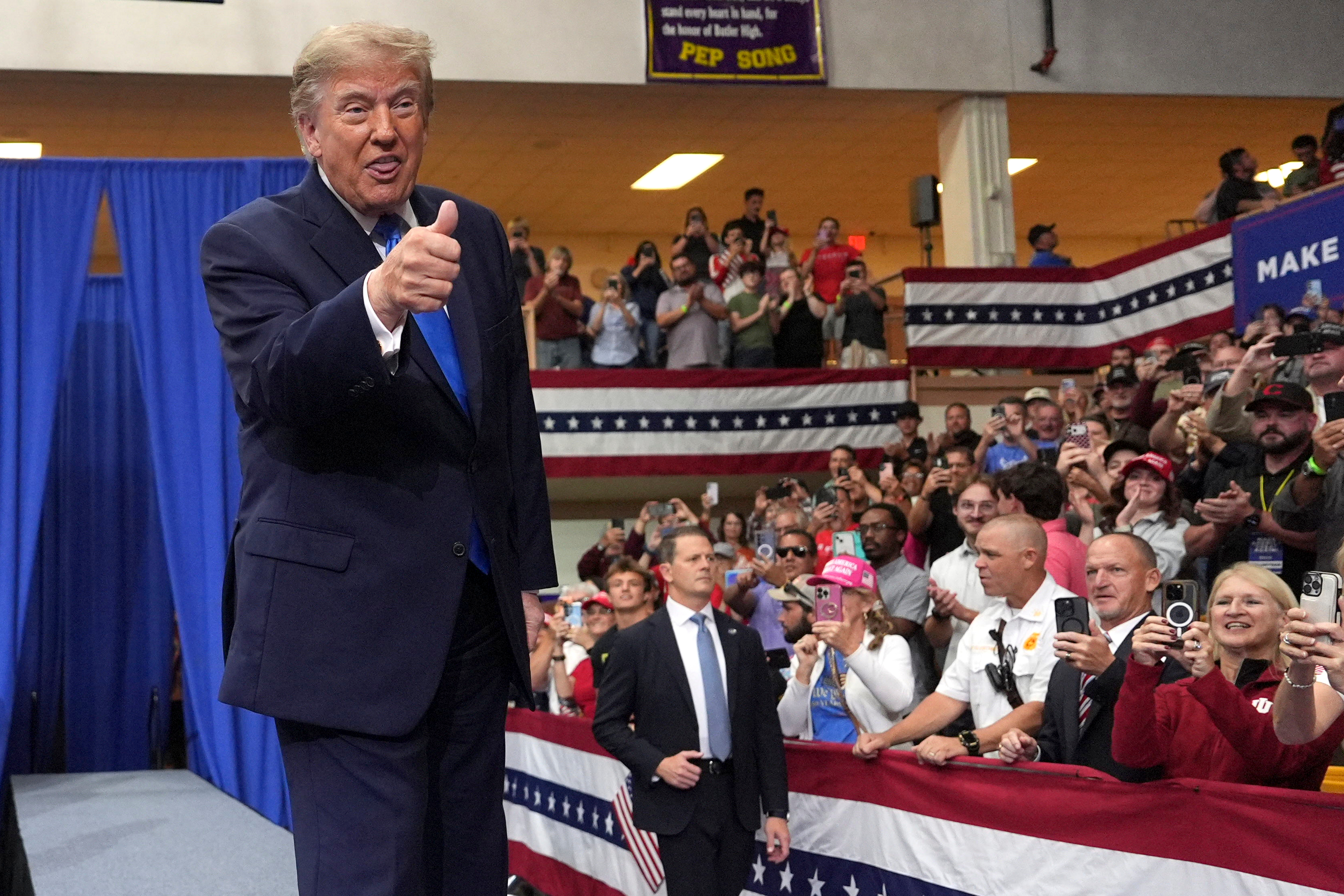 President Donald Trump arrives to speak during an event at Butler High School in Vandalia, Ohio, Saturday, Oct. 3, 2026. (AP Photo/Mark Schiefelbein)