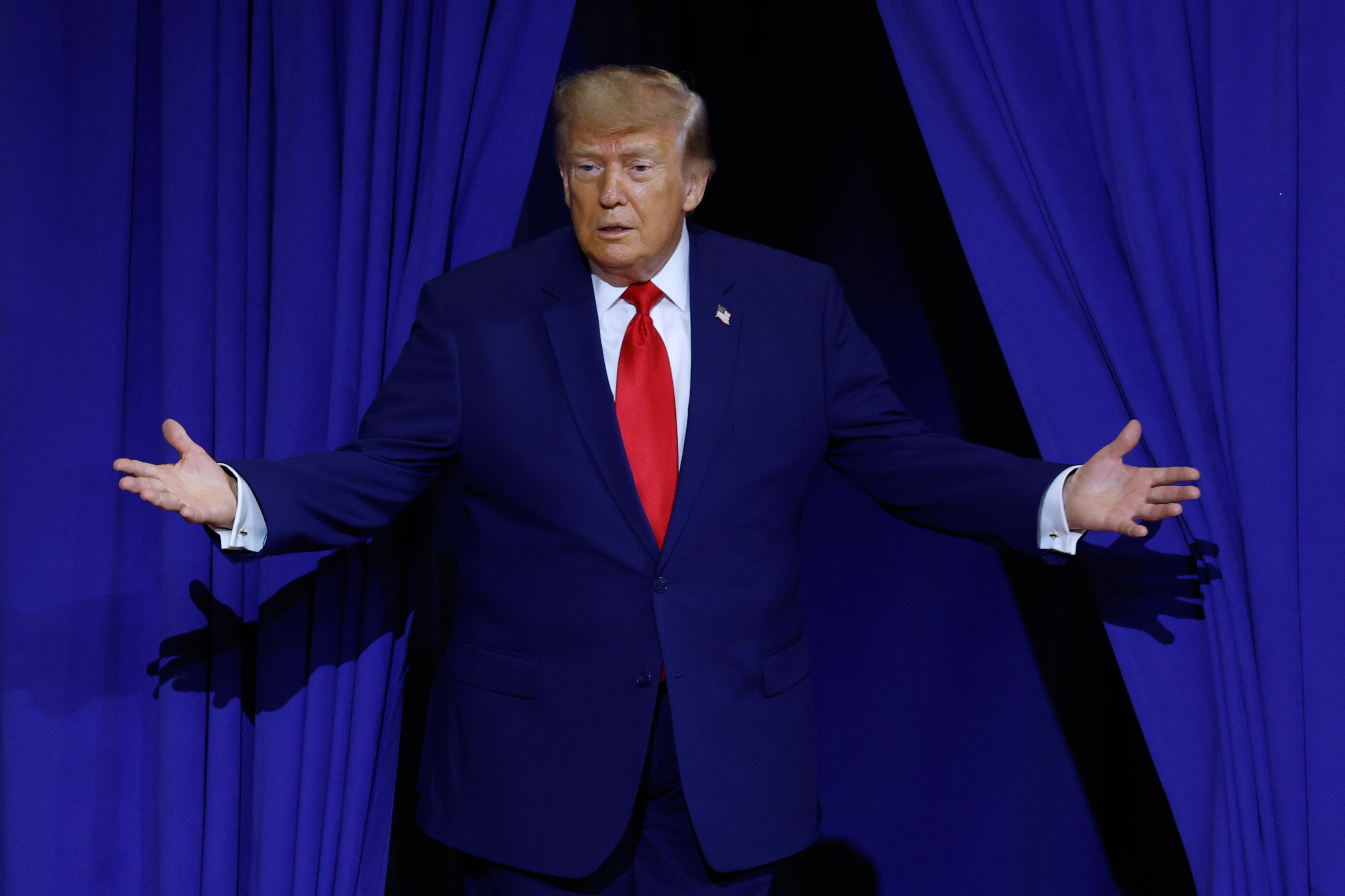 President Donald Trump arrives to speak to a rally at Wheeler High School in Marietta, Ga., Wednesday, July 22, 2026. (AP Photo/Erik S. Lesser)