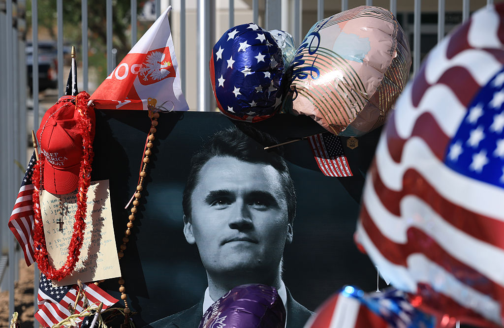 PHOENIX, ARIZONA - SEPTEMBER 16: A photograph of Charlie Kirk is seen in a makeshift memorial outside of the headquarters of Turning Point USA on September 16, 2025, in Phoenix, Arizona. Kirk, the CEO and co-founder of Turning Point USA, was shot and killed on September 10th while speaking at an event for his