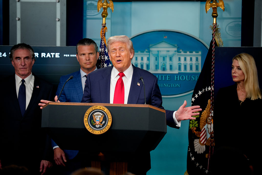 WASHINGTON, DC - AUGUST 11: U.S. President Donald Trump, accompanied by U.S. Interior Secretary Doug Burgum (L), U.S. Defense Secretary Pete Hegseth (2nd-L) and U.S. Attorney General Pam Bondi (R), speaks during a news conference in the James S. Brady Press Briefing Room of the White House August 11, 2025 in Washington, DC. Trump announced he will use his authority to place the DC Metropolitan Police Department under federal control to assist in crime prevention in the nation's capital, and that the National Guard will be deployed to DC. (Photo by Andrew Harnik/Getty Images)