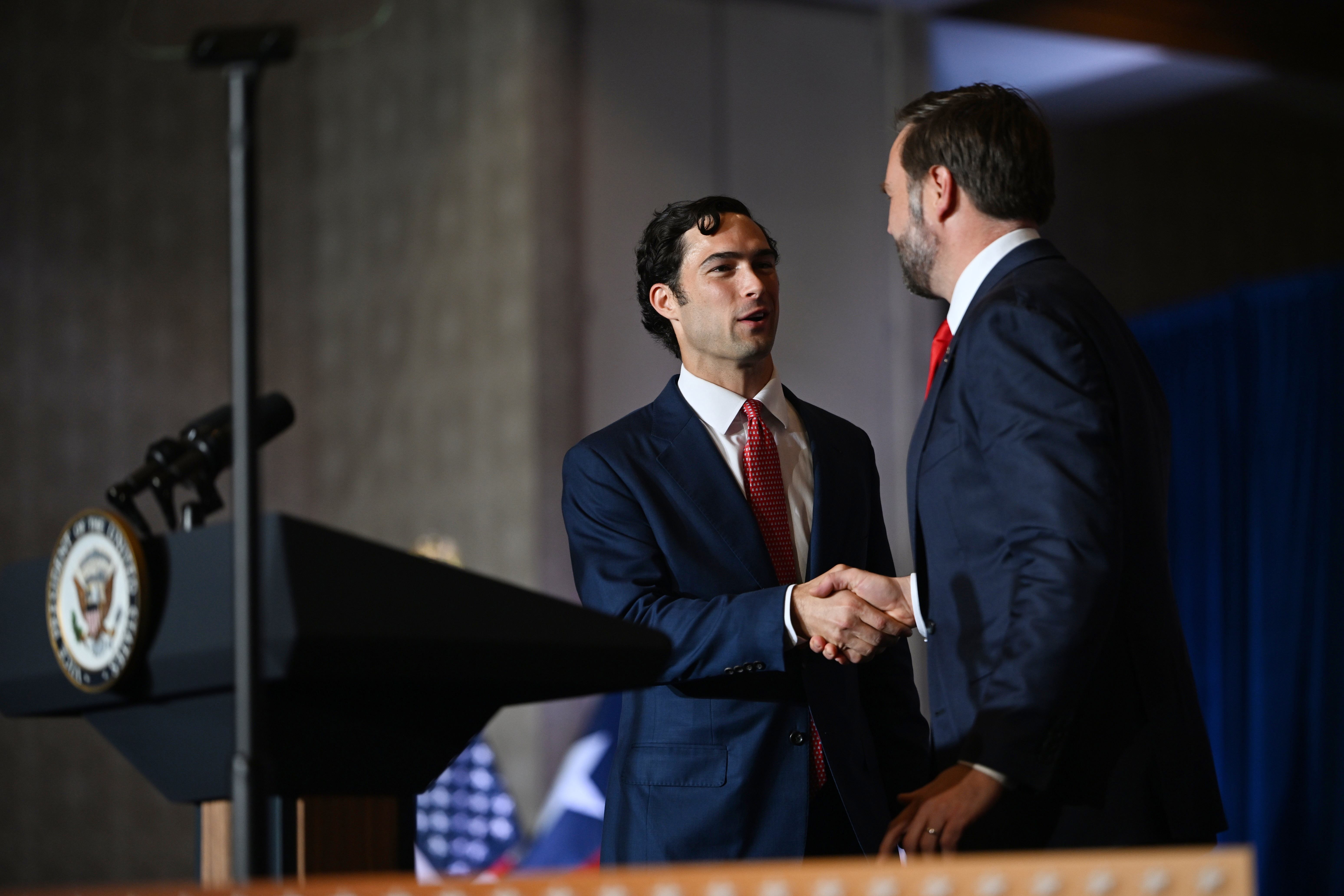 Vice President JD Vance, right, delivers remarks as the guest speaker at a rally aimed at boosting local Republican candidates, including Eric Flores in Texas' 34th Congressional District, Wednesday, Sept. 30, 2026, in Harlingen, Texas. (Kenny Holston/The New York Times via AP, Pool)