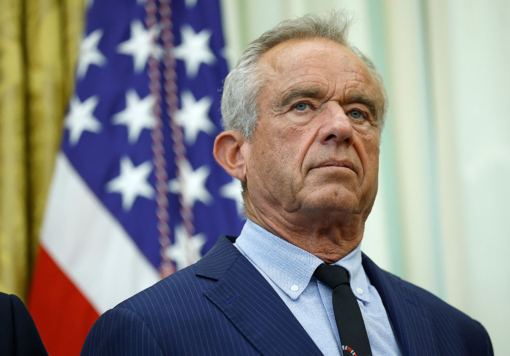 WASHINGTON, DC - OCTOBER 16: U.S. Health and Human Services Secretary Robert F. Kennedy Jr. attends an event as U.S. President Donald Trump delivers remarks in the Oval Office of the White House on October 16, 2025 in Washington, DC. Trump outlined plans to expand vitro fertilization (IVF) access by encouraging workplace benefits to include access to IVF and infertility coverage. (Photo by Kevin Dietsch/Getty Images)