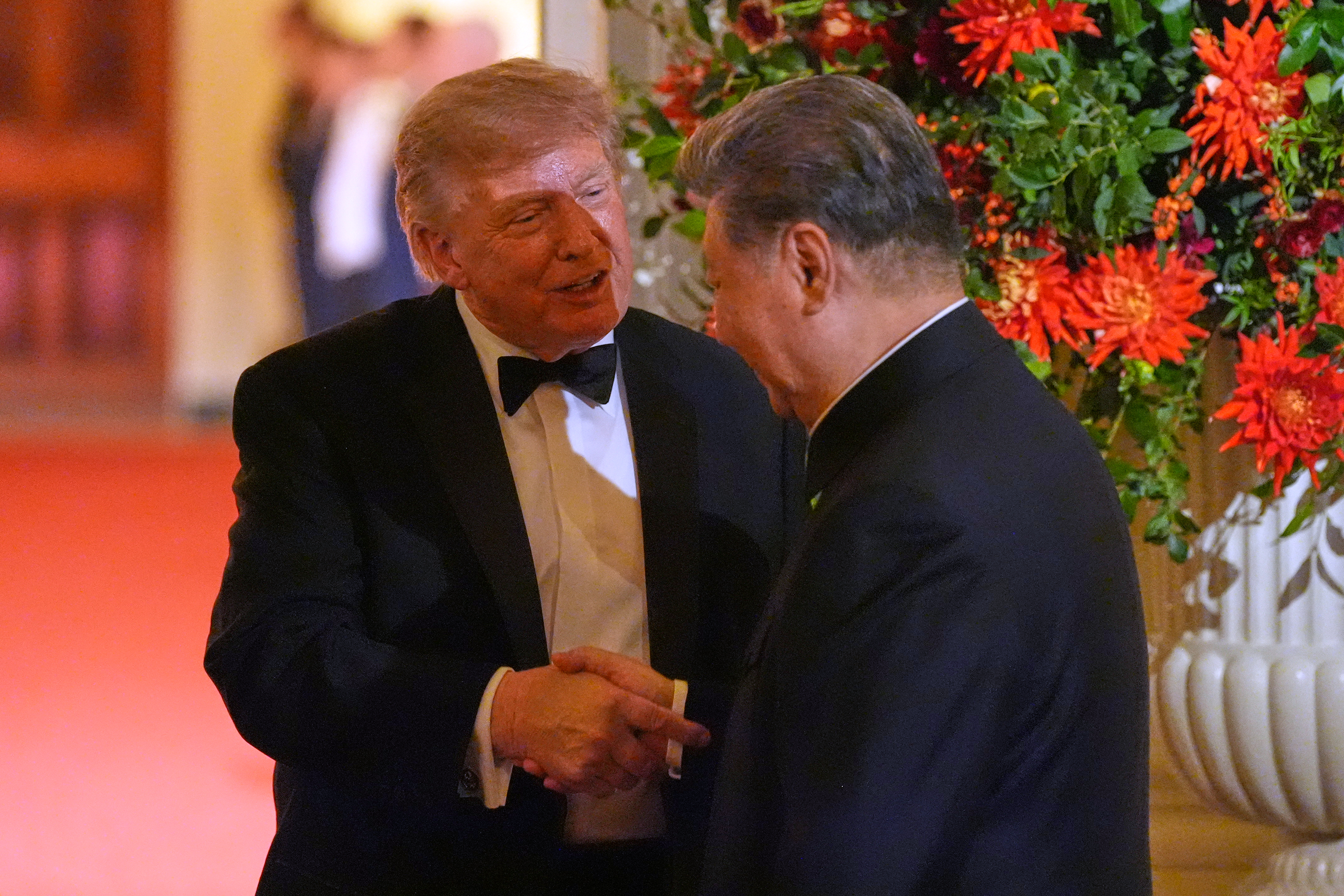 President Donald Trump shakes hands with China's President Xi Jinping during a State Dinner in the East Room of the White House, Thursday, Sept. 24, 2026, in Washington. (AP Photo/Alex Brandon)