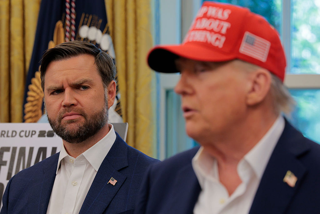 WASHINGTON, DC - AUGUST 22:   Vice President JD Vance looks at U.S. President Donald Trump as he talks in the Oval Office  August 22, 2025 in Washington, DC.  Trump announced the FIFA World Cup 2026 draw will take place at The Kennedy Center.   (Photo by Chip Somodevilla/Getty Images)