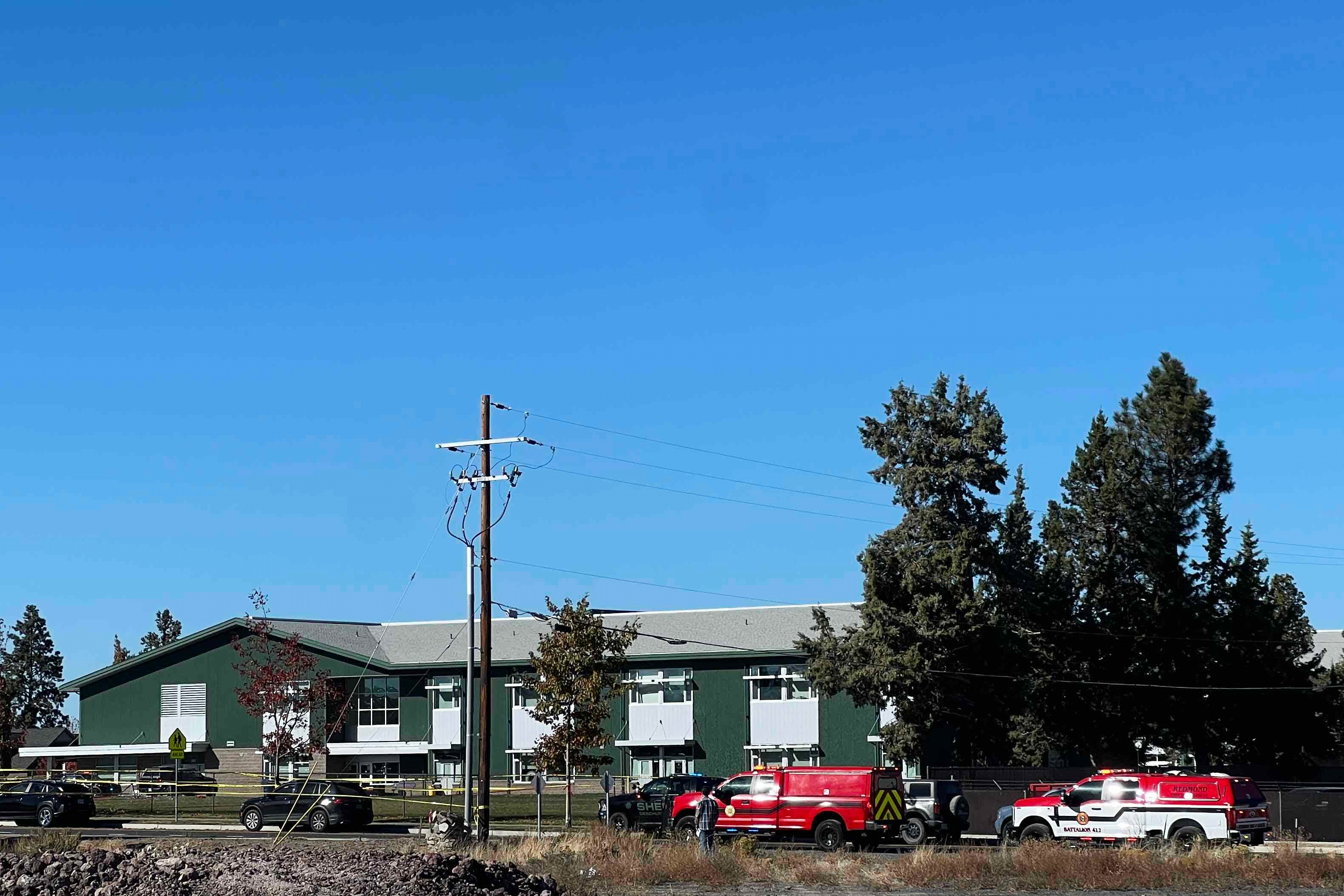 Police tape is placed outside Silver Rail Elementary school, where a shooting took place, on Thursday, Oct. 15, 2026 in Bend, Ore. (AP Photo/Joe Kline)
