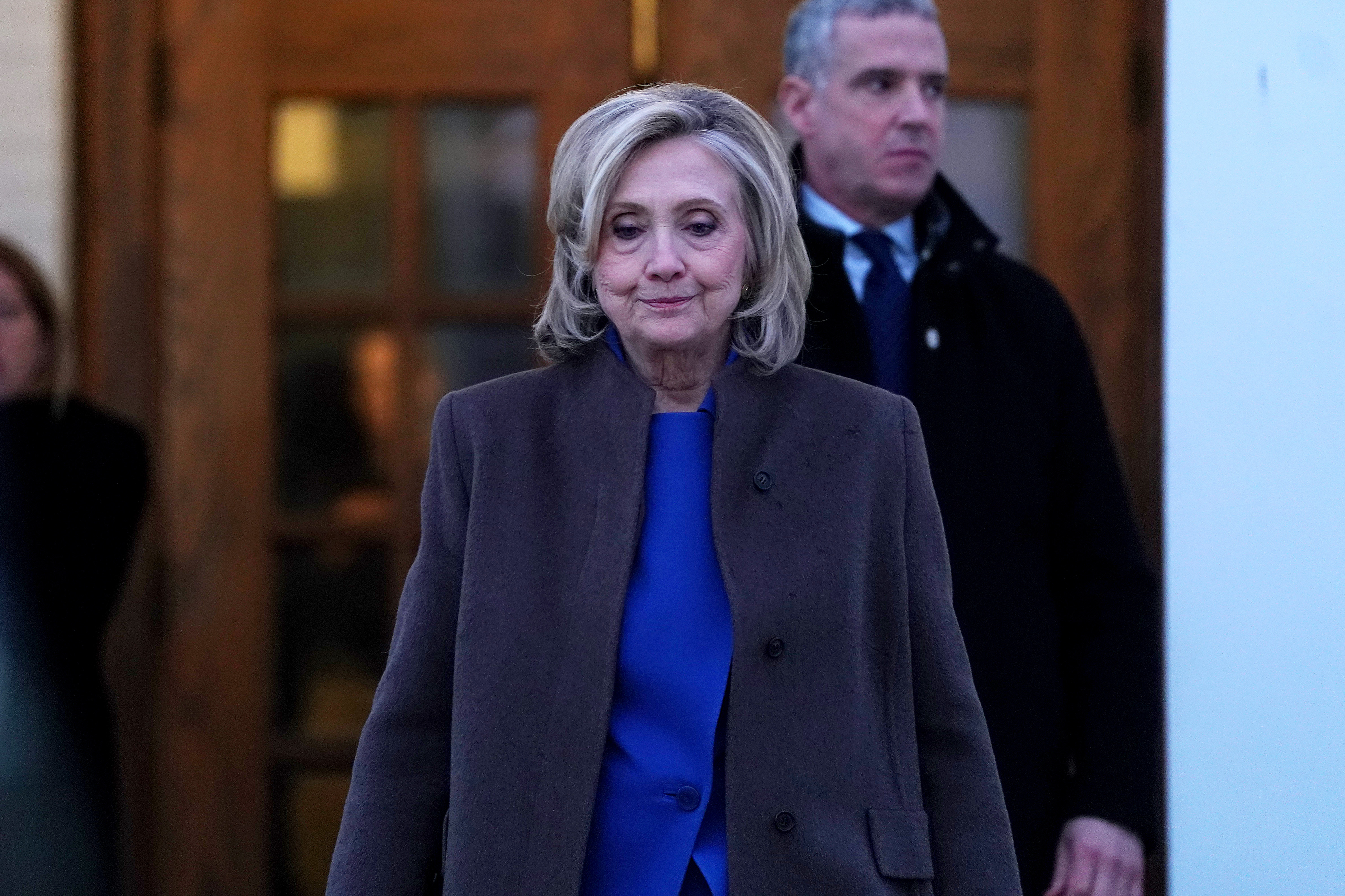 CHAPPAQUA, NEW YORK - FEBRUARY 26: Former U.S. Secretary of State Hillary Clinton walks out to talk to reporters after testifying in a closed-door deposition with the House Oversight Committee at the Chappaqua Performing Arts Center on February 26, 2026 in Chappaqua, New York. Former Secretary of State Hillary Clinton provided testimony to the Republican-led House Oversight Committee as part of an ongoing inquiry into the late sex offender Jeffrey Epstein's case. Former U.S. President Bill Clinton is expected to testify tomorrow. (Photo by David Dee Delgado/Getty Images)