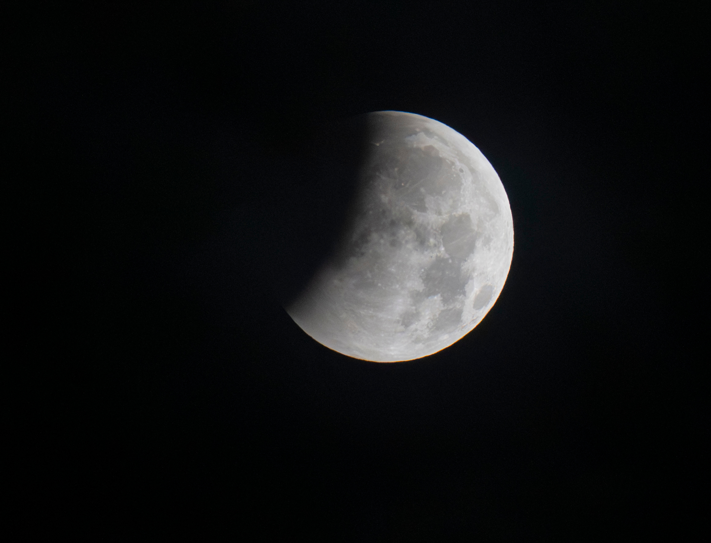 The beginning of a partial lunar eclipse is seen from Munich, Germany, Friday, Aug. 28, 2026. (Peter Kneffel/dpa via AP)