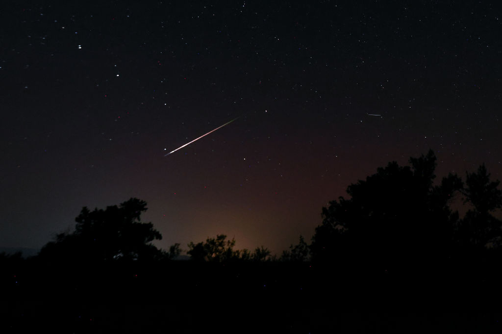 Meteors are seen along the Milky Way in the sky on August 12, 2024 in Madrid, Spain. (Image Source: Aldara Zarraoa/Getty Images)