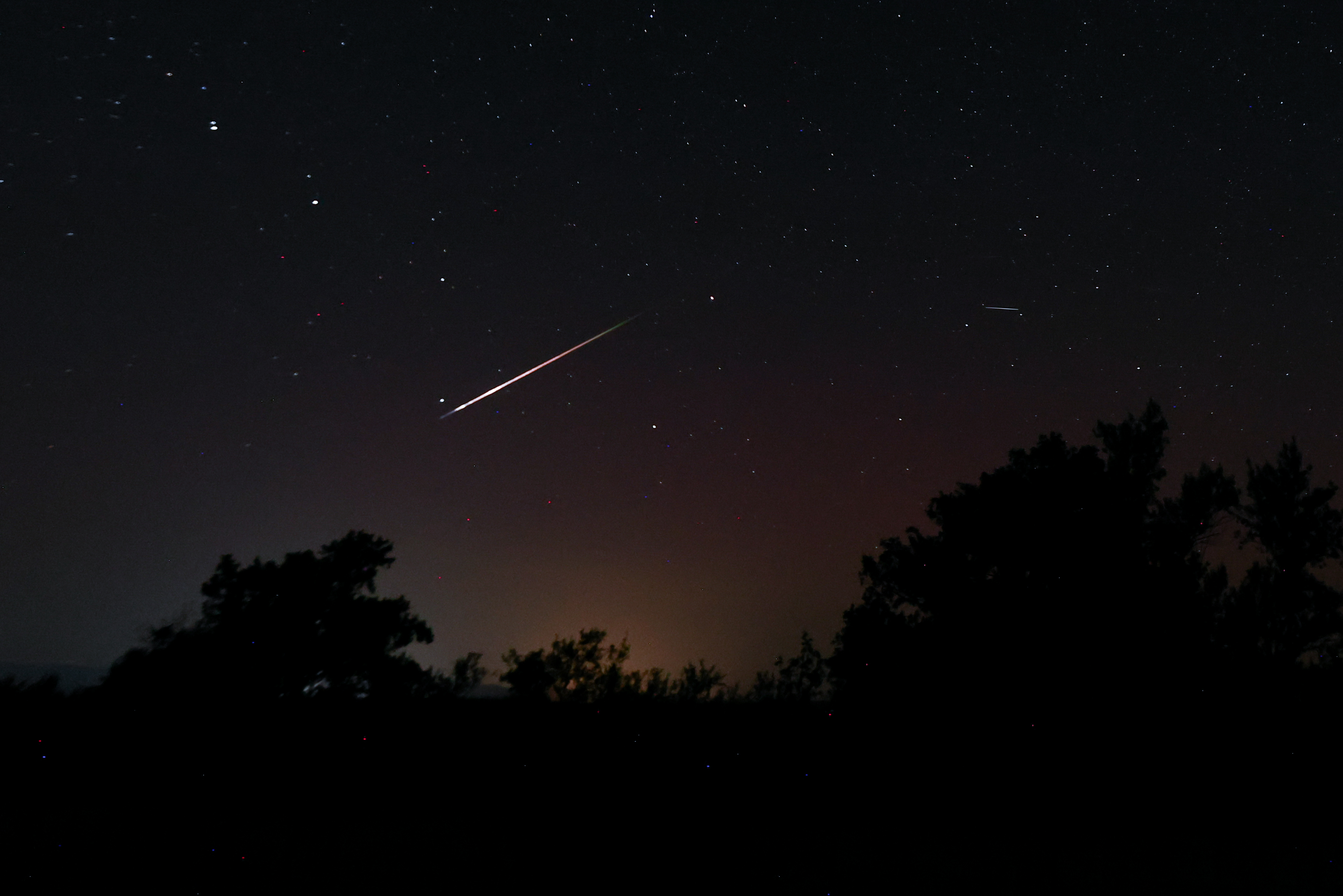 VARIOUS CITIES, SPAIN - AUGUST 12: Meteors are seen along the Milky Way in the sky on August 12, 2024 in Madrid, Spain. The Perseid meteor shower is reaching peak visibility in the coming days. (Photo by Aldara Zarraoa/Getty Images)