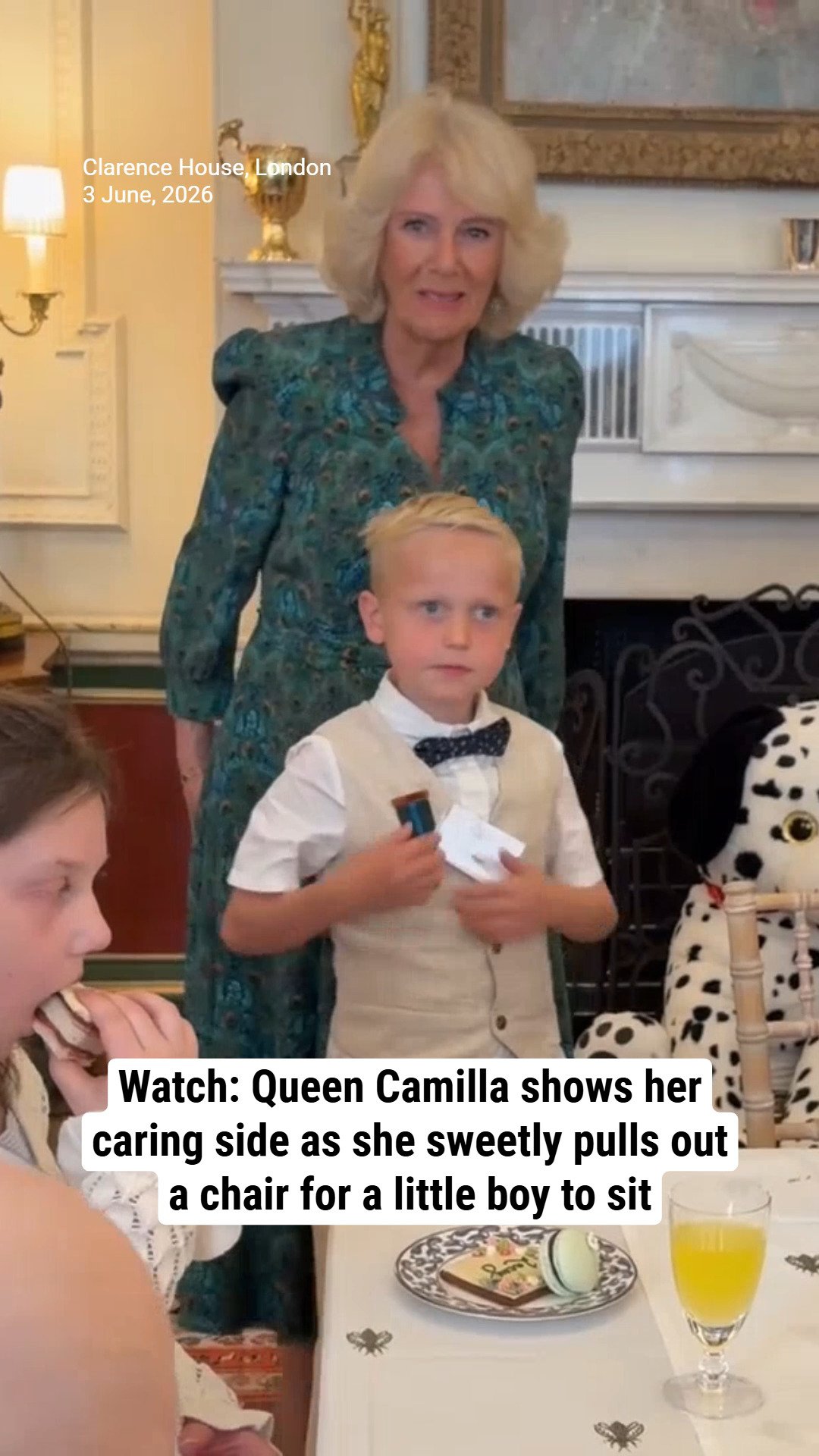 Watch: Queen Camilla shows her caring side as she pulls out a chair for a little boy to sit
