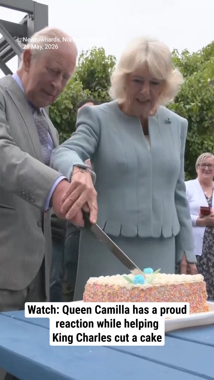 Watch: Queen Camilla has a proud reaction while helping King Charles cut a cake