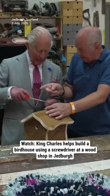 Watch: King Charles helps build a birdhouse using a screwdriver at a wood shop in Jedburgh