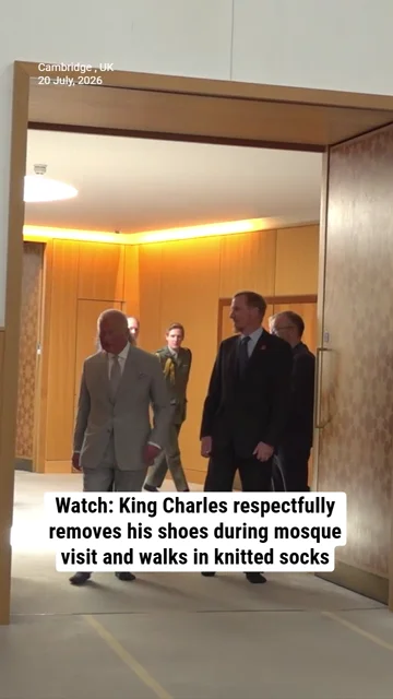 Watch: King Charles respectfully removes his shoes during mosque visit and walks in knitted socks