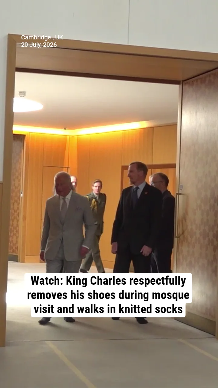 Watch: King Charles respectfully removes his shoes during mosque visit and walks in knitted socks