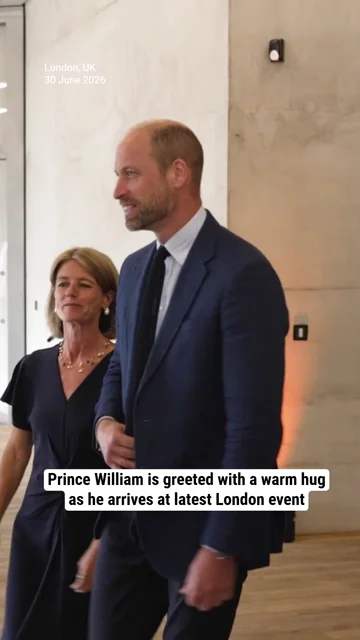 Prince William is greeted with a warm hug as he arrives at latest London event