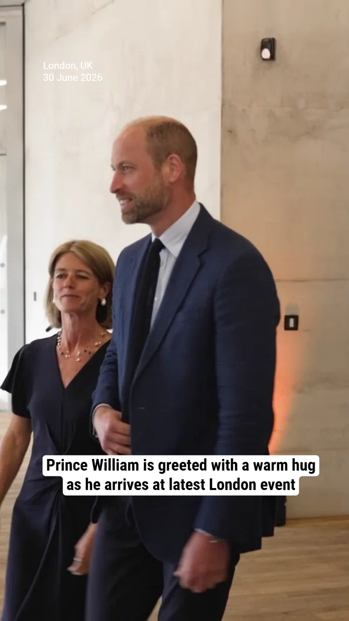 Prince William is greeted with a warm hug as he arrives at latest London event
