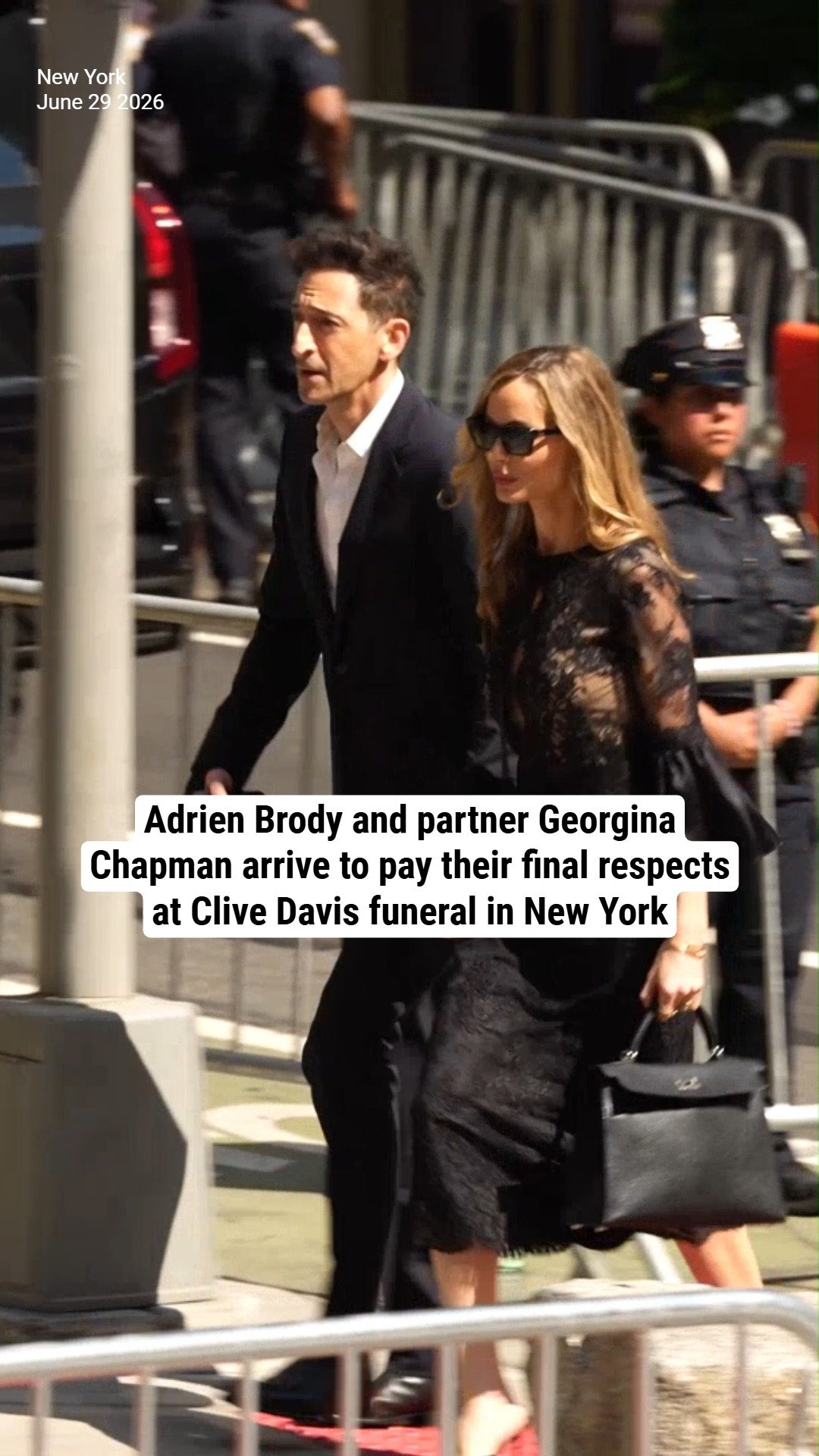 Adrien Brody and partner Georgina Chapman arrive to pay their final respects at Clive Davis' funeral in New York