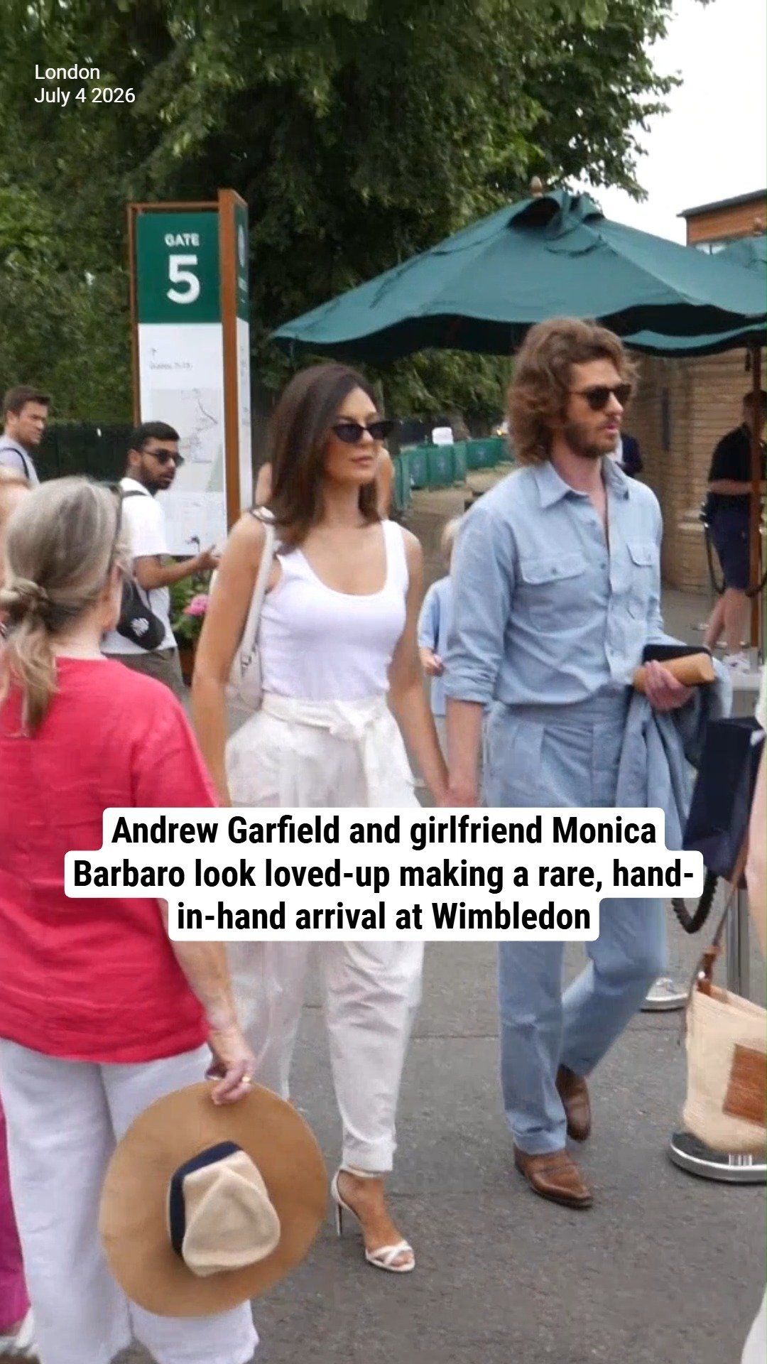 Andrew Garfield and girlfriend Monica Barbaro look loved-up making a rare, hand-in-hand arrival at Wimbledon