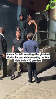 Andrew Garfield sweetly guides girlfriend Monica Barbaro while departing the 'One Night Only' NYC premiere