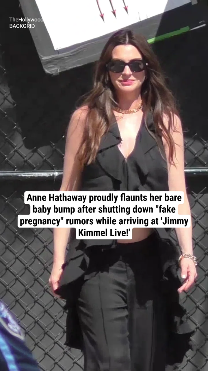 Anne Hathaway proudly flaunts her bare baby bump after shutting down "fake pregnancy" rumors while arriving at 'Jimmy Kimmel Live!'