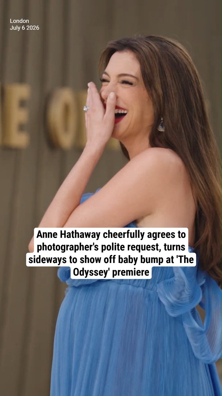 Anne Hathaway cheerfully agrees to photographer's polite request, turns sideways to show off baby bump at 'The Odyssey' premiere