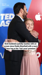 Brett Goldstein joyfully reunites with on-screen niece Elodie Blomfield with a warm bear hug at the 'Ted Lasso' premiere