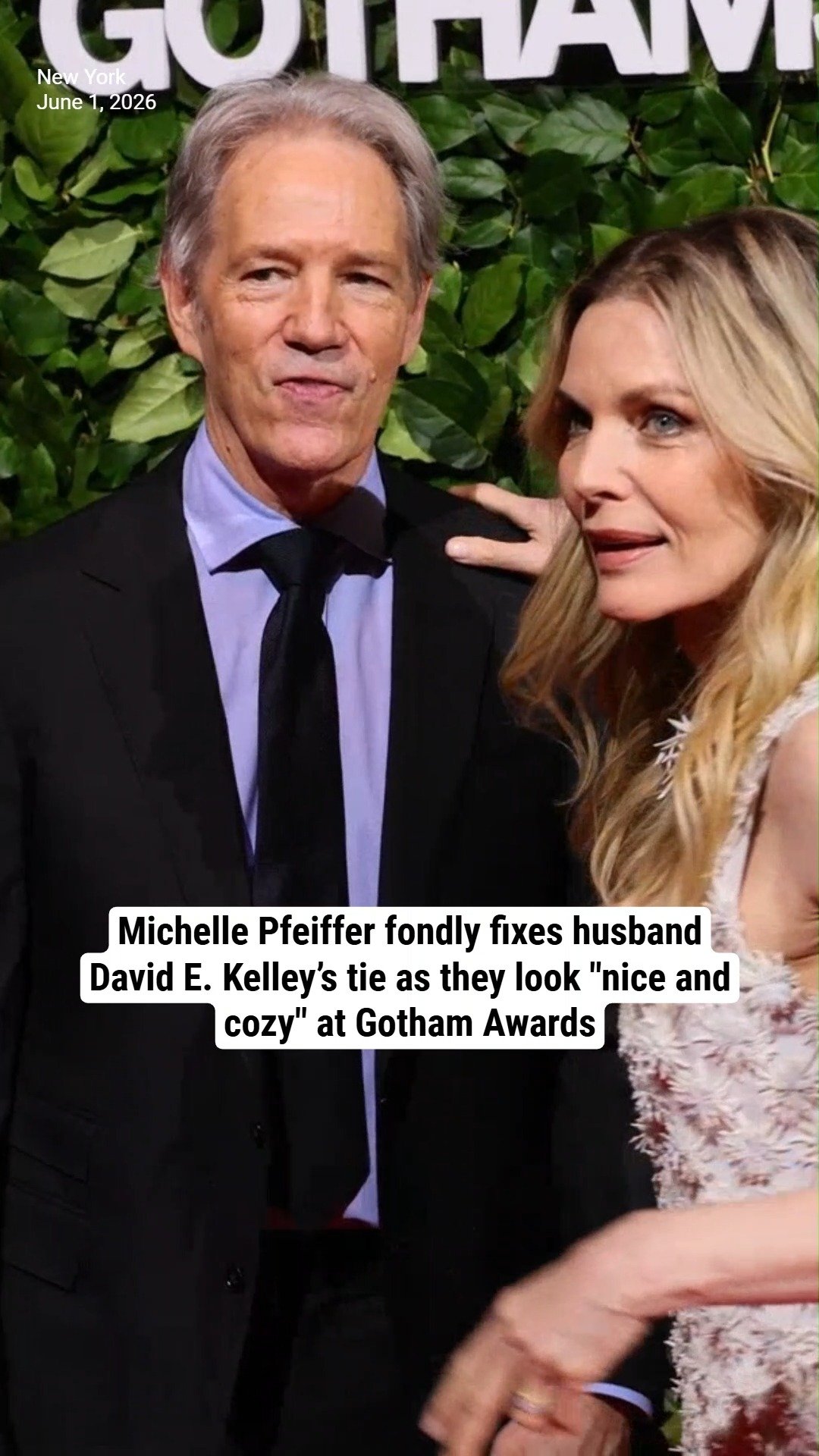 Michelle Pfeiffer fondly fixes husband David E. Kelley’s tie as they look "nice and cozy" at Gotham Awards