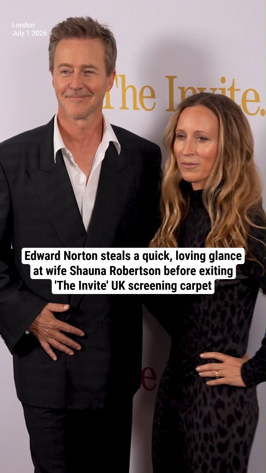Edward Norton steals a quick, loving glance at wife Shauna Robertson before exiting 'The Invite' UK screening carpet