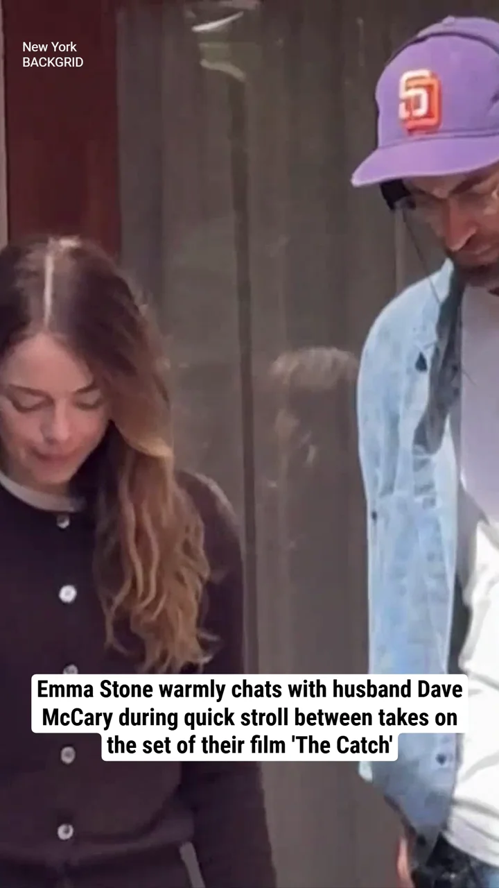 Emma Stone warmly chats with husband Dave McCary during quick stroll between takes on the set of their film 'The Catch'