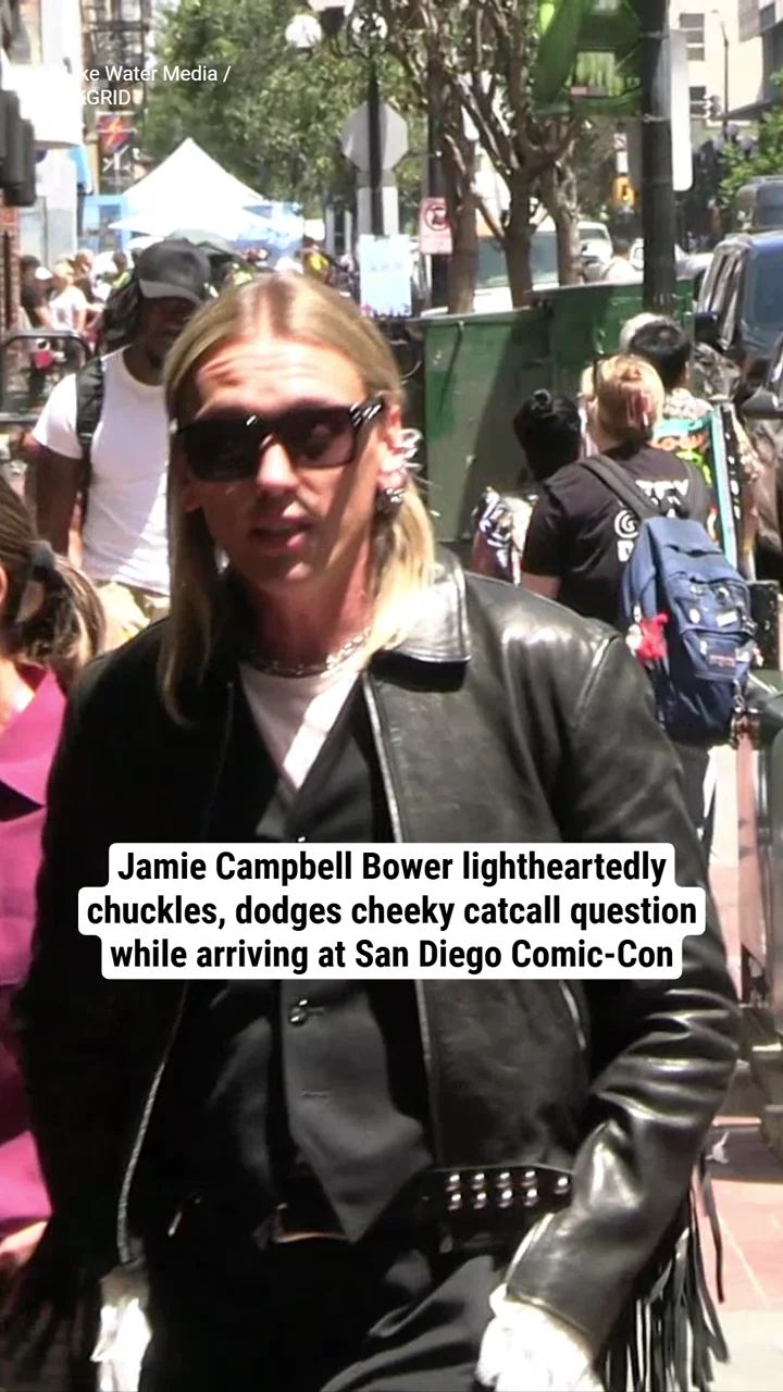 Jamie Campbell Bower lightheartedly chuckles, dodges cheeky catcall question while arriving at San Diego Comic-Con