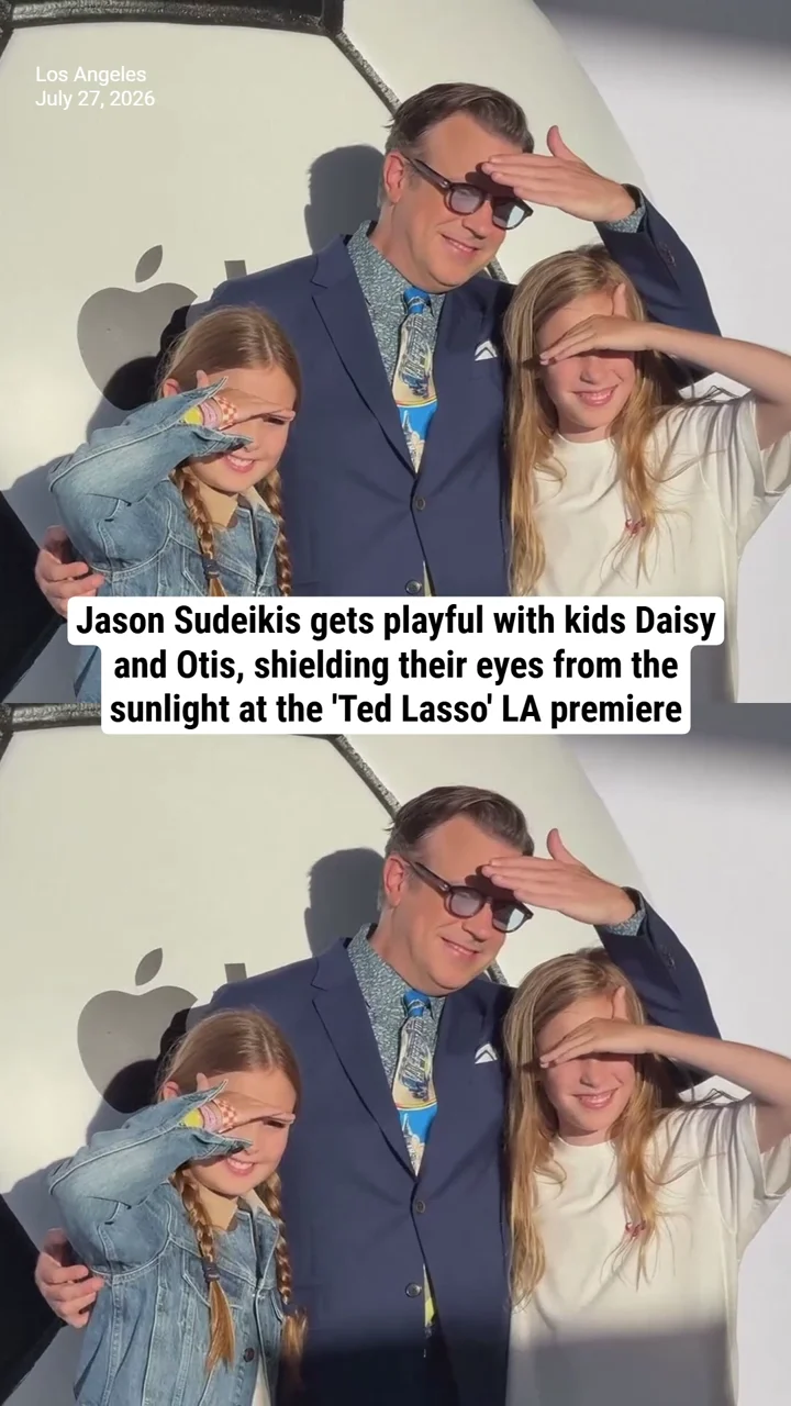 Jason Sudeikis gets playful with kids Daisy and Otis, shielding their eyes from the sunlight at the 'Ted Lasso' LA premiere