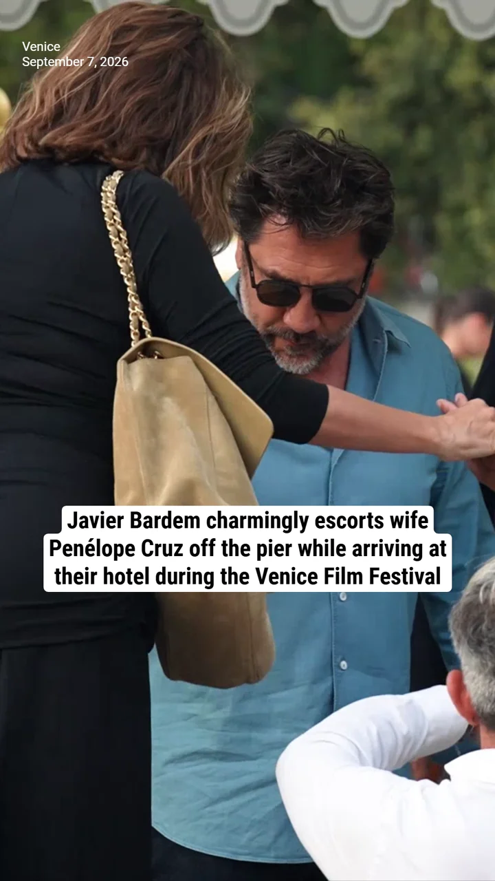 Javier Bardem charmingly escorts wife Penélope Cruz off the pier while arriving at their hotel during the Venice Film Festival