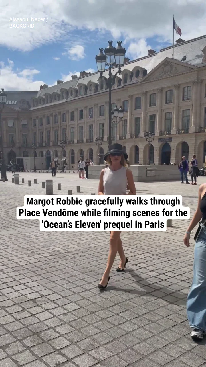 Margot Robbie gracefully walks through Place Vendôme while filming scenes for the 'Ocean’s Eleven' prequel in Paris