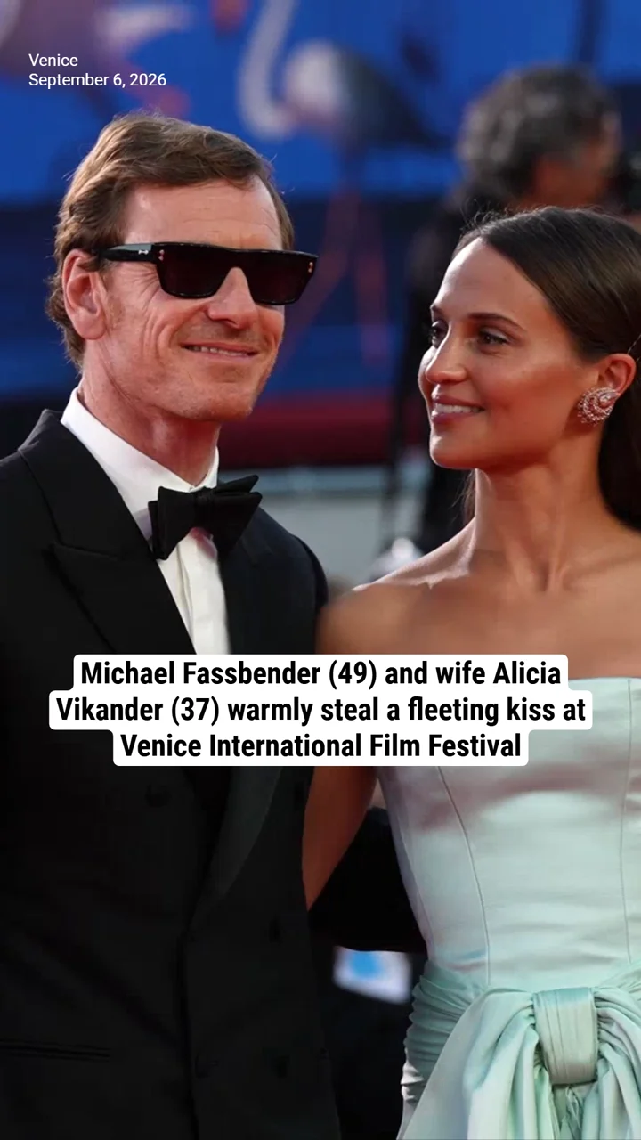 Michael Fassbender (49) and wife Alicia Vikander (37) warmly steal a fleeting kiss at Venice International Film Festival